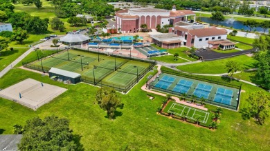 Nestled within the prestigious Century Village East, this rare on Hillsboro Pines Golf in Florida - for sale on GolfHomes.com, golf home, golf lot