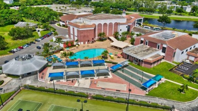 Nestled within the prestigious Century Village East, this rare on Hillsboro Pines Golf in Florida - for sale on GolfHomes.com, golf home, golf lot