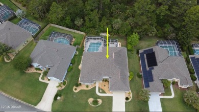 This stunning 4-bedroom saltwater pool home offers both elegance on Plantation Bay Golf and Country Club in Florida - for sale on GolfHomes.com, golf home, golf lot