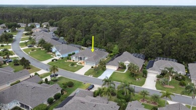 This stunning 4-bedroom saltwater pool home offers both elegance on Plantation Bay Golf and Country Club in Florida - for sale on GolfHomes.com, golf home, golf lot