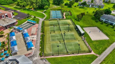 Nestled within the prestigious Century Village East, this rare on Hillsboro Pines Golf in Florida - for sale on GolfHomes.com, golf home, golf lot