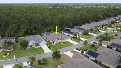 This stunning 4-bedroom saltwater pool home offers both elegance on Plantation Bay Golf and Country Club in Florida - for sale on GolfHomes.com, golf home, golf lot