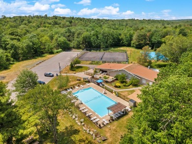 Step into this bright and beautifully styled 3-bedroom, 2-bath on Pocono Farms Country Club in Pennsylvania - for sale on GolfHomes.com, golf home, golf lot
