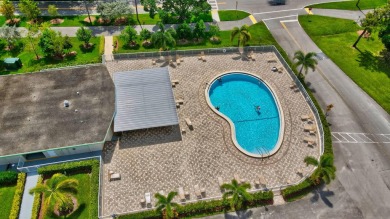Nestled within the prestigious Century Village East, this rare on Hillsboro Pines Golf in Florida - for sale on GolfHomes.com, golf home, golf lot