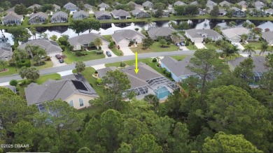 RECENT PRICE REDUCTION! This stunning 4-bedroom saltwater pool on Plantation Bay Golf and Country Club in Florida - for sale on GolfHomes.com, golf home, golf lot