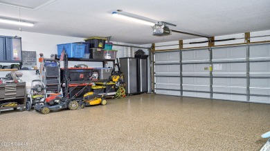 RECENT PRICE REDUCTION! This stunning 4-bedroom saltwater pool on Plantation Bay Golf and Country Club in Florida - for sale on GolfHomes.com, golf home, golf lot