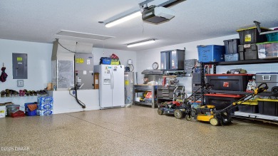 RECENT PRICE REDUCTION! This stunning 4-bedroom saltwater pool on Plantation Bay Golf and Country Club in Florida - for sale on GolfHomes.com, golf home, golf lot