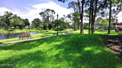 RECENT PRICE REDUCTION! This stunning 4-bedroom saltwater pool on Plantation Bay Golf and Country Club in Florida - for sale on GolfHomes.com, golf home, golf lot