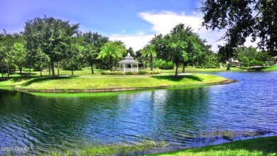 RECENT PRICE REDUCTION! This stunning 4-bedroom saltwater pool on Plantation Bay Golf and Country Club in Florida - for sale on GolfHomes.com, golf home, golf lot
