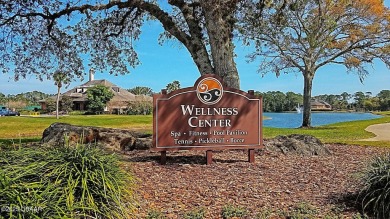 RECENT PRICE REDUCTION! This stunning 4-bedroom saltwater pool on Plantation Bay Golf and Country Club in Florida - for sale on GolfHomes.com, golf home, golf lot