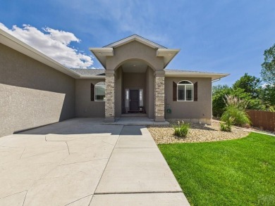 Welcome to this stunning ranch-style home overlooking the golf on Desert Hawk At Pueblo West in Colorado - for sale on GolfHomes.com, golf home, golf lot