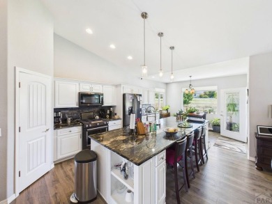 Welcome to this stunning ranch-style home overlooking the golf on Desert Hawk At Pueblo West in Colorado - for sale on GolfHomes.com, golf home, golf lot