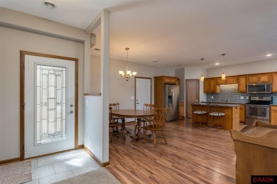 This charming and spacious 3-bedroom, 2-bathroom townhome offers on Mankato Golf Club in Minnesota - for sale on GolfHomes.com, golf home, golf lot