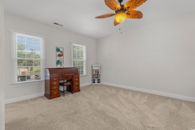 Welcome to this charming 2-bedroom, 2-bathroom home in the heart on The Tradition Golf Club in South Carolina - for sale on GolfHomes.com, golf home, golf lot