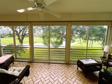SPECTACULAR EXPANSIVE WATER/GOLF VIEW from this REMODELED 2nd on Wynmoor Golf Course in Florida - for sale on GolfHomes.com, golf home, golf lot