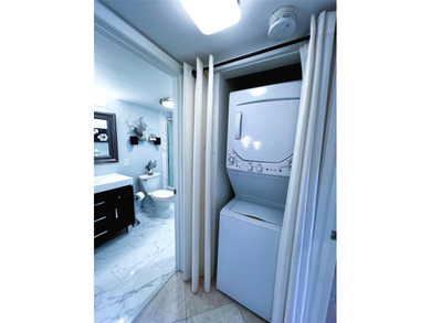 EXPANSIVE GOLF/WATER/CLUBHOUSE VIEW from this Large LUXURY MODEL on Wynmoor Golf Course in Florida - for sale on GolfHomes.com, golf home, golf lot