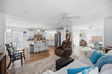 COZY AND UPDATED 2/2 home located in the desirable 55+ community on Twin Isles Country Club in Florida - for sale on GolfHomes.com, golf home, golf lot