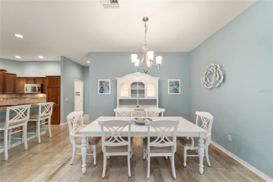 BOND PAID and NEW ROOF on this LOVELY BEGONIA designer home with on The Links of Spruce Creek in Florida - for sale on GolfHomes.com, golf home, golf lot