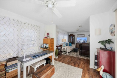 COZY AND UPDATED 2/2 home located in the desirable 55+ community on Twin Isles Country Club in Florida - for sale on GolfHomes.com, golf home, golf lot