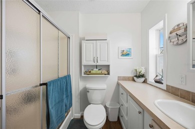 COZY AND UPDATED 2/2 home located in the desirable 55+ community on Twin Isles Country Club in Florida - for sale on GolfHomes.com, golf home, golf lot