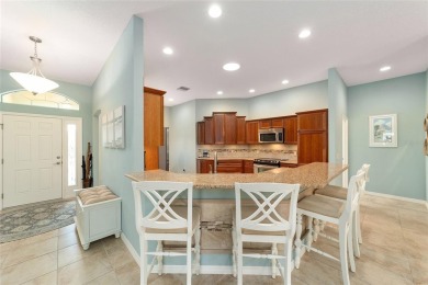 BOND PAID and NEW ROOF on this LOVELY BEGONIA designer home with on The Links of Spruce Creek in Florida - for sale on GolfHomes.com, golf home, golf lot