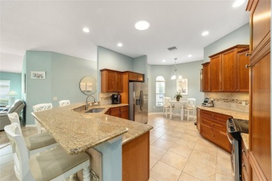 BOND PAID and NEW ROOF on this LOVELY BEGONIA designer home with on The Links of Spruce Creek in Florida - for sale on GolfHomes.com, golf home, golf lot