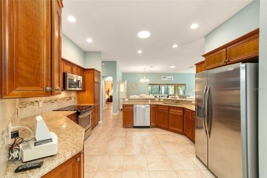BOND PAID and NEW ROOF on this LOVELY BEGONIA designer home with on The Links of Spruce Creek in Florida - for sale on GolfHomes.com, golf home, golf lot