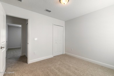 This beautiful, well-maintained home perfectly blends comfort on LPGA International Golf Course in Florida - for sale on GolfHomes.com, golf home, golf lot