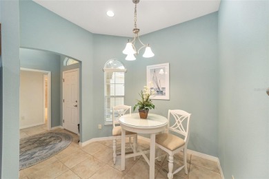 BOND PAID and NEW ROOF on this LOVELY BEGONIA designer home with on The Links of Spruce Creek in Florida - for sale on GolfHomes.com, golf home, golf lot