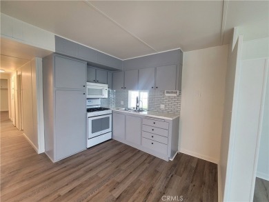 Welcome to this adorable single wide newly remodeled mobile home on Rancho Del Rey Golf Club in California - for sale on GolfHomes.com, golf home, golf lot