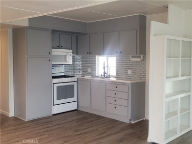Welcome to this adorable single wide newly remodeled mobile home on Rancho Del Rey Golf Club in California - for sale on GolfHomes.com, golf home, golf lot