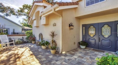 Graceful and secure pool home with tranquil preserve views in on The Meadows Golf and Country Club in Florida - for sale on GolfHomes.com, golf home, golf lot