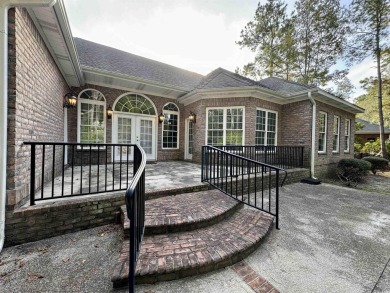 Located on a quiet cul-de-sac inside The Reserve, a gated on The Reserve Golf Club at Pawleys Island in South Carolina - for sale on GolfHomes.com, golf home, golf lot