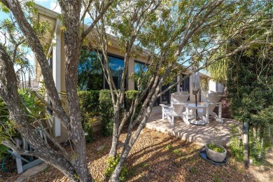 BOND PAID and NEW ROOF on this LOVELY BEGONIA designer home with on The Links of Spruce Creek in Florida - for sale on GolfHomes.com, golf home, golf lot