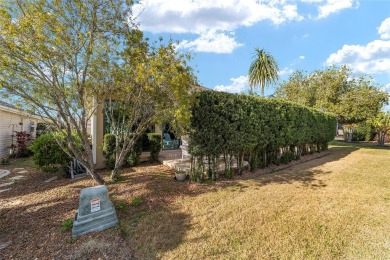 BOND PAID and NEW ROOF on this LOVELY BEGONIA designer home with on The Links of Spruce Creek in Florida - for sale on GolfHomes.com, golf home, golf lot