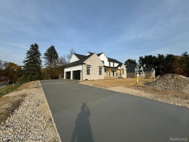 Final touches being completed now on this beautiful new on Prestwick Village Golf Club in Michigan - for sale on GolfHomes.com, golf home, golf lot