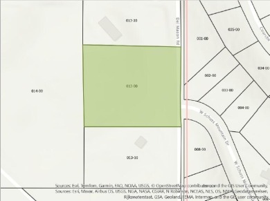 Wooded 2+ acre parcel at the foothills of Schuss Mountain on Schuss Mountain Golf Club in Michigan - for sale on GolfHomes.com, golf home, golf lot