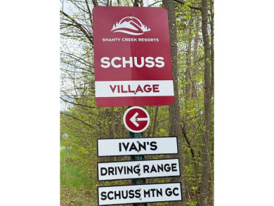 Wooded 2+ acre parcel at the foothills of Schuss Mountain on Schuss Mountain Golf Club in Michigan - for sale on GolfHomes.com, golf home, golf lot