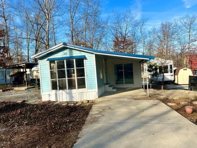 Charming Fully Remodeled Home in Holiday Out RV Park. Discover on Lake Tansi Village Country Club in Tennessee - for sale on GolfHomes.com, golf home, golf lot