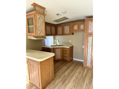 Charming Fully Remodeled Home in Holiday Out RV Park. Discover on Lake Tansi Village Country Club in Tennessee - for sale on GolfHomes.com, golf home, golf lot