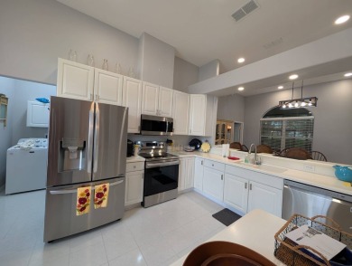Welcome to this beautifully updated home located on the 10th on Royal Oaks Golf Club in Florida - for sale on GolfHomes.com, golf home, golf lot
