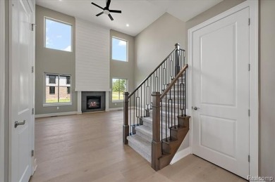 This turn-key, move-in ready home comes complete with sod and on Bello Woods Golf Club in Michigan - for sale on GolfHomes.com, golf home, golf lot