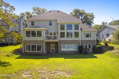 Welcome to your serene retreat in the sought-after beach town of on Oyster Bay Golf Links in North Carolina - for sale on GolfHomes.com, golf home, golf lot