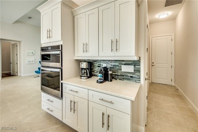 Experience true Florida living in this beautifully appointed on Royal Tee Country Club in Florida - for sale on GolfHomes.com, golf home, golf lot