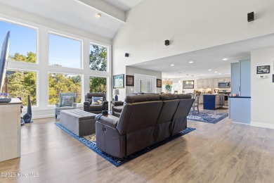 Welcome to your serene retreat in the sought-after beach town of on Oyster Bay Golf Links in North Carolina - for sale on GolfHomes.com, golf home, golf lot