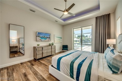 Experience true Florida living in this beautifully appointed on Royal Tee Country Club in Florida - for sale on GolfHomes.com, golf home, golf lot