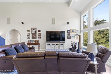 Welcome to your serene retreat in the sought-after beach town of on Oyster Bay Golf Links in North Carolina - for sale on GolfHomes.com, golf home, golf lot