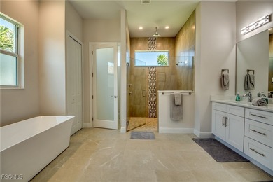 Experience true Florida living in this beautifully appointed on Royal Tee Country Club in Florida - for sale on GolfHomes.com, golf home, golf lot