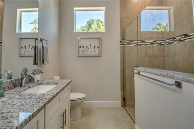 Experience true Florida living in this beautifully appointed on Royal Tee Country Club in Florida - for sale on GolfHomes.com, golf home, golf lot