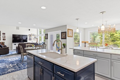 Welcome to your serene retreat in the sought-after beach town of on Oyster Bay Golf Links in North Carolina - for sale on GolfHomes.com, golf home, golf lot